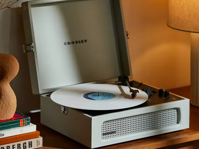 A Record Player That She Can Stream from Her Phone